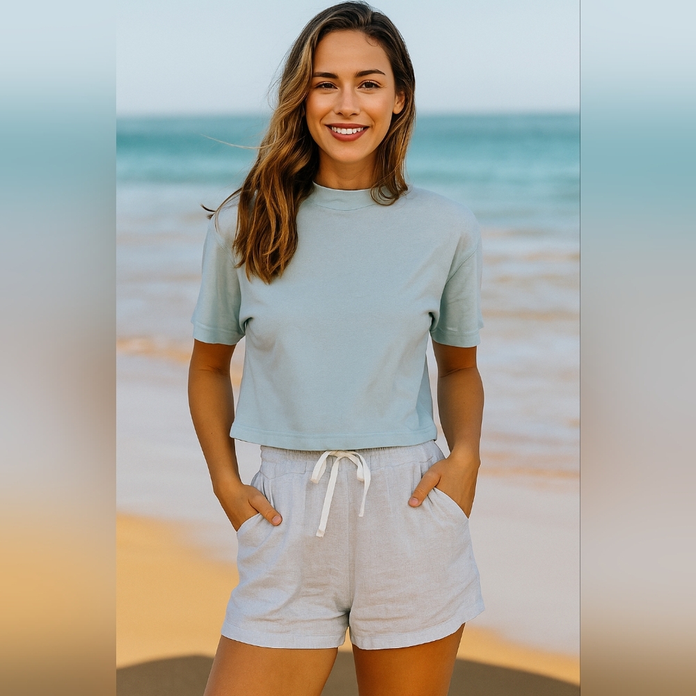 3/$15! Free People Light Blue Cropped Tee